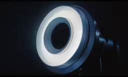 an illuminated photograph on a tripod for shooting, with an extra soft light