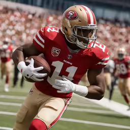a man running with a football in a crowded stadium