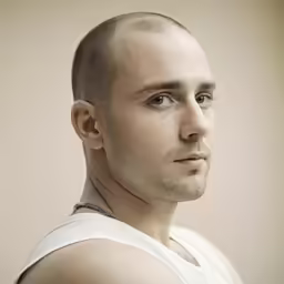 an image of a man that has a bald head
