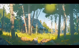 a small field with some rocks in front of trees
