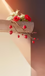 red flowers growing on top of a brick wall