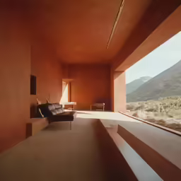 an empty room in a desert with stairs