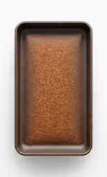 a brown square box sitting on top of a table