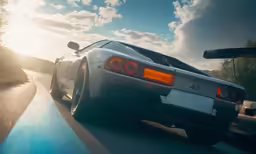 the rear end of a white sports car on a rural road