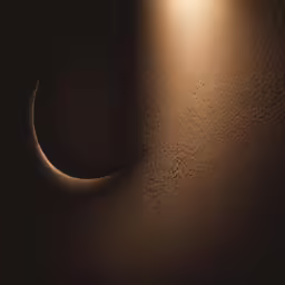 a wall in the dark has condensation on it