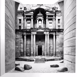 a large room with pillars, two doors and steps