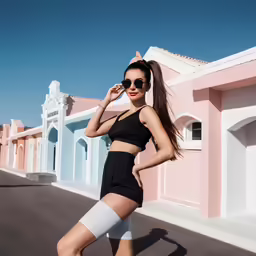 the woman is standing with her leg up in the air