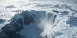 a group of people on a mountain top with an aerial view of the earth