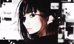 the woman in black is very close to the camera