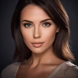 a young woman is posing for a studio photo