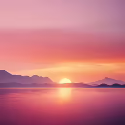 a picture of a sunset with some mountains in the distance