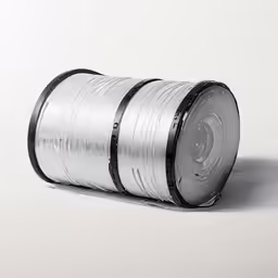 a rolled silver and black tape on white background