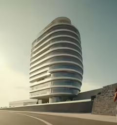 a man riding a bike past a large building