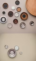 several different bowls and pans lined up on the table