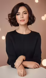 woman sitting on table with glowing lights behind her