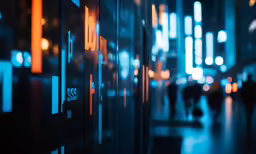 blurry image of people on the street at night