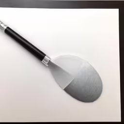 a white paper with a pen and a drawing of an umbrella