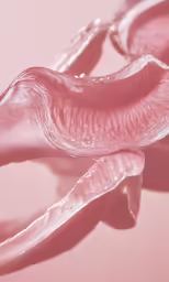 an image of two pink lips on a pink background