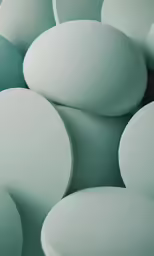 light green and teal blue balls with white highlights and shadows