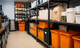 a big room full of lots of yellow containers