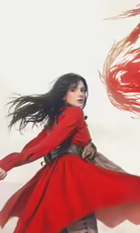 a woman is flying in the air near a cloud