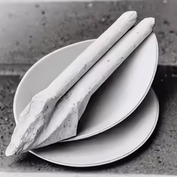 a close up of two plates with food