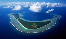 a tropical island in the middle of the ocean