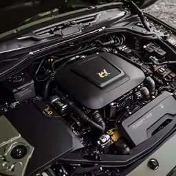 the engine of a vehicle, with its hood open