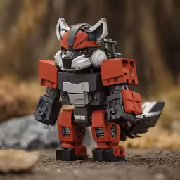a close up of a toy robot on dirt ground