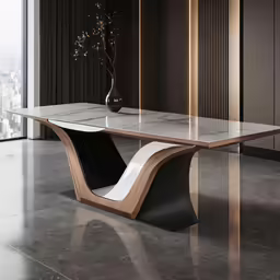 the elegant dining table is in the middle of the room