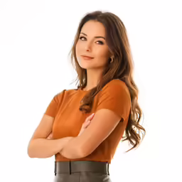 a woman with her arms crossed standing with a serious look on her face