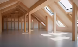 there are some windows in the corner of the room