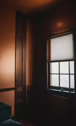 a window in a room that has been painted black