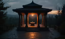 the sunset is shining brightly over a gazebo