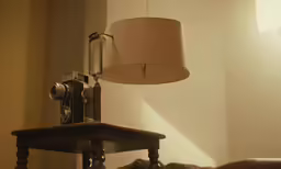 the old phone is sitting on top of the table
