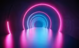 the dark tunnel is lit up with red and blue light