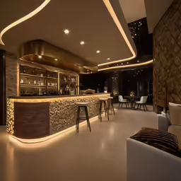 a bar that is lit up inside the room