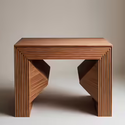 a modern wood desk with the top turned down
