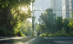two people standing in the middle of a park