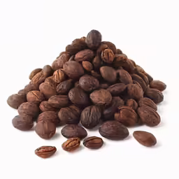 a pile of nuts with one nut still on top