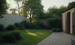 a small backyard with an outdoor shower