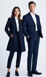 two people in formal wear standing side by side