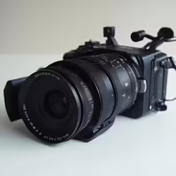 a camera with a telephote mounted on it